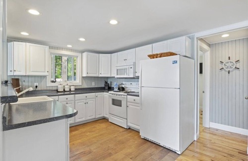 Acton House | Dog Friendly Lakefront Cottage with Private Dock and Kayaks