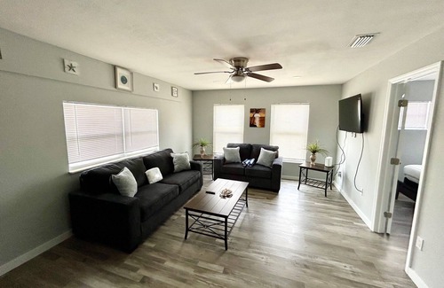 Mid Island Condo | 🐾 Dog Friendly, Spacious Beach Retreat, only Steps to Sugary Sand, Conveniences and all the Fun!