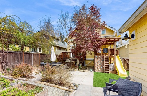 West Woodland House | Dog-friendly spacious retreat with patio, backyard oasis, & W/D - walkable location