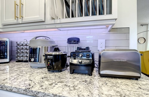Palm Harbor House | Dog friendly summer escape: Waterfront, Game Room, Hot Tub