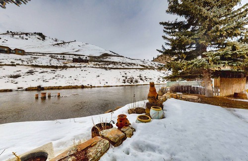 Jackson Hole Cabin | Dog-friendly waterfront cabin on Flat Creek with wood stove, creek view, firepit