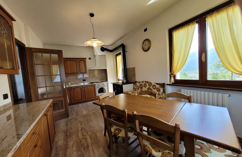 Costa Volpino Villa | Domus Bianca Single villa surrounded by greenery with a wide view of Lake Iseo