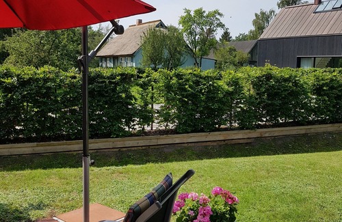 Wieck auf dem Darss Apartment | Don't rush me - modern ground floor apartment with south-facing terrace & beach chair in Wieck a. Darß