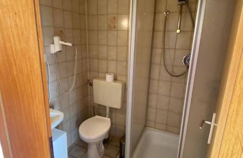 Butjadingen Cottage | Doppelzimmer mit Schlafsofa - Pension "zum Leuchtfeuer"