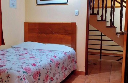 Cusco Historic Center Hotel | Double bedroom with private bathroom