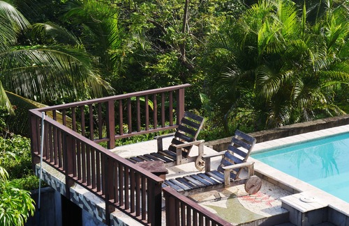 Torio House | Double room with partial ocean view balcony | Beachfront Boutique Hotel & Pool