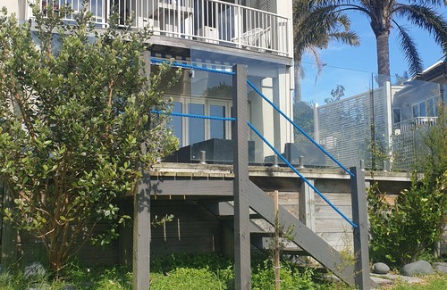 Gulf Harbour House | Down the steps. Two Bedrooms Lake views.