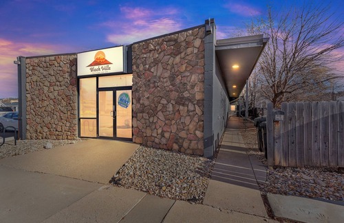 Spearfish Apartment | Downtown 2 story property by RedAwning