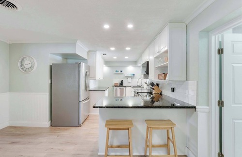 Stuart House | Downtown Beach Cottage - Heated Pool