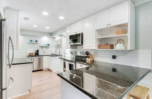 Stuart House | Downtown Beach Cottage - Heated Pool