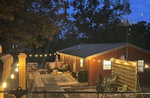 Cotter House | Downtown Cotter Retreat - Great Outdoor Space! 200 feet of String Lights!