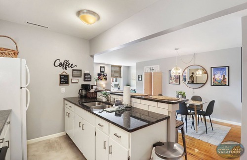 Lake Geneva Apartment | Downtown Lake Geneva-Chicago |Above Shops on Main |Onsite Parking |Fun Themed Urban Apartment |King
