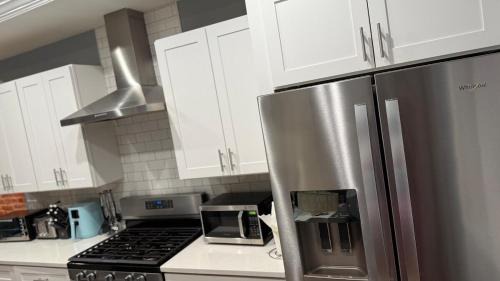 Greektown House | Downtown upper canton 3 bdrm 3 bath home with rooftop and parking pad