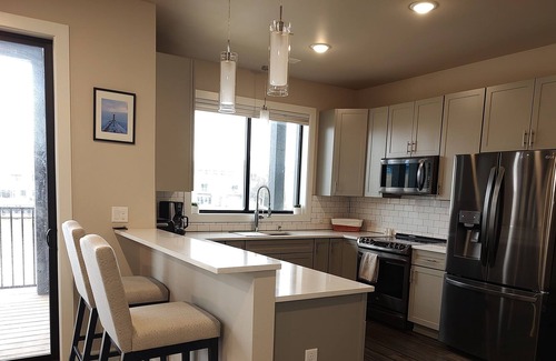 Sheboygan Condo | Downtown waterfront condo. Full hook-up boat slip! Close to beach! Private deck!