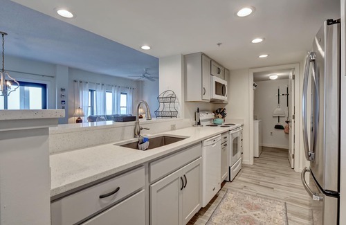 Shell Island Condo | DR 1309 – Getaway to this oceanfront condo with pool and direct beach access