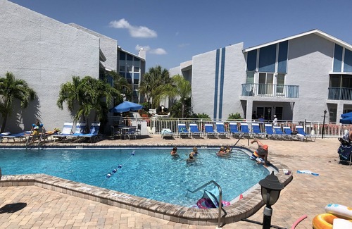 Madeira Beach Condo | DREAM GETAWAY 2 BD 2BATH 1st floor Waterfront Condo complex! Pools,Patios etc