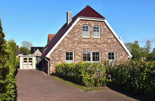 Neßmersiel House | Dream vacation home NordseeStar with fireplace and lounge in Neßmersiel
