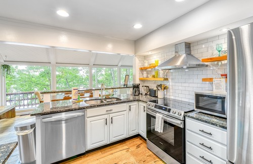 Livingston House | Dreamy lakefront gem on wooded property with private beach, dock & fast WiFi