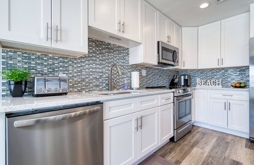 Crystal Beach Condo | Dreamy Oceanfront Penthouse: Indulge in Luxury Spa, Panoramic Views & Beach Fun!