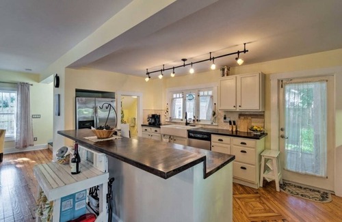 Gillespie Park House | Driftwood House: Historical Elegance Modern Comfort