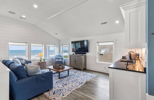 Duck House | Duck oceanfront home with theater room and elevator, steps from the beach!