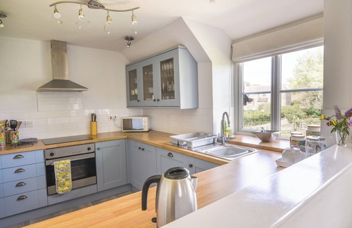 Bridport House | EAST BARN, pet friendly, with a garden in Charmouth