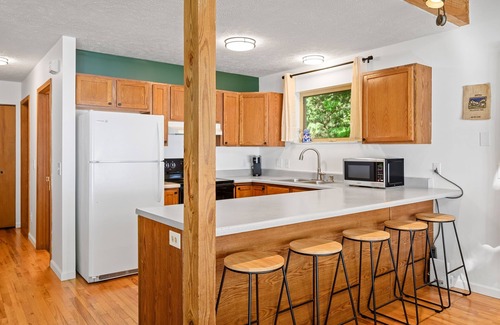 Traverse City Cottage | East Beach Cottage: Sandy | Secluded | 3 King Beds