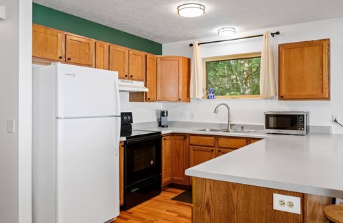 Traverse City Cottage | East Beach Cottage: Sandy | Secluded | 3 King Beds