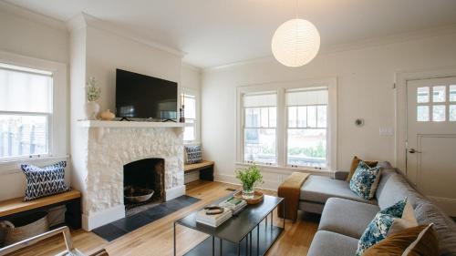 Eastwood House | East Nashville Retreat w Fireplace Backyard Firepit Outdoor Dining Minutes from Downtown Music Food Nightlife Chapel House by AvantStay