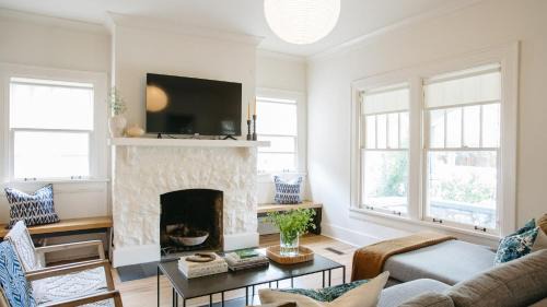 Eastwood House | East Nashville Retreat w Fireplace Backyard Firepit Outdoor Dining Minutes from Downtown Music Food Nightlife Chapel House by AvantStay