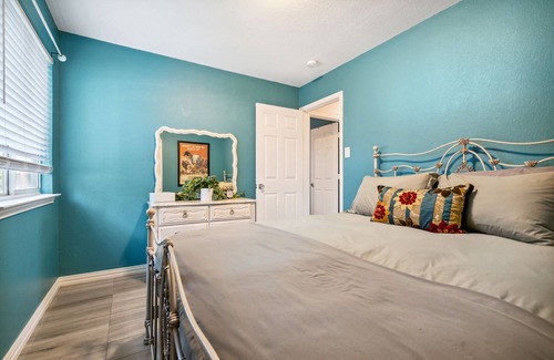 Kyle House | Eclectic Oasis: Artful & Colorful Comfort