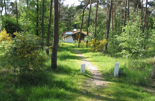 Herpen House | Eco holiday home with wood stove, in a holiday park in the middle of nature