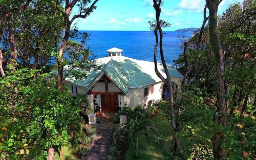 Calibishie Villa | Eden's Gate Oceanside Estate
