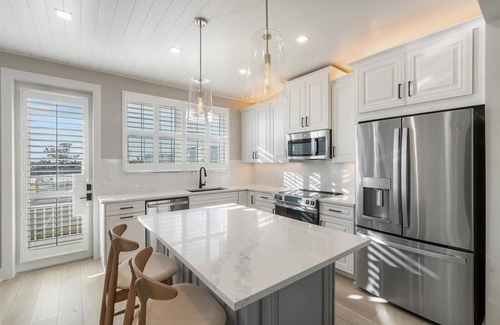 Cortez House | Edgewater Escape: Luxury Eco Canal-Front Home Near Beach with Pool & Dock