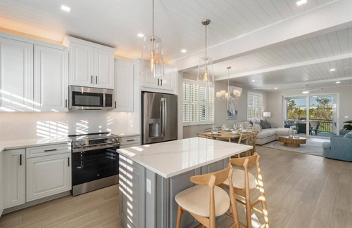 Cortez House | Edgewater Escape: Luxury Eco Canal-Front Home Near Beach with Pool & Dock