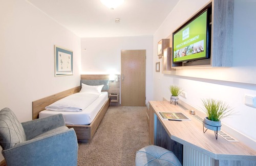 Bad Soden-Salmuenster Apartment | Einzelzimmer Business mit Dusche, WC und Balkon