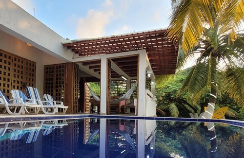 Monitos House | El Laguito Beach House, Pool and Beach Kiosk.