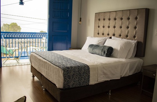 Filandia Hotel | El reloj casa hotel