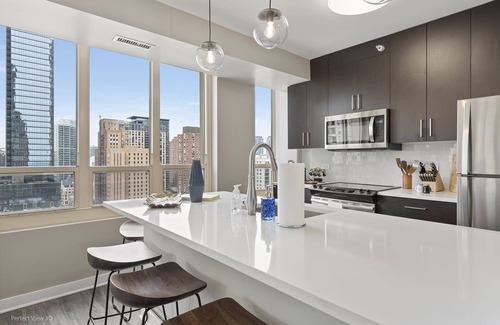 Rush and Division Apartment | Elegant 2BR with Resort Amenities & City Views