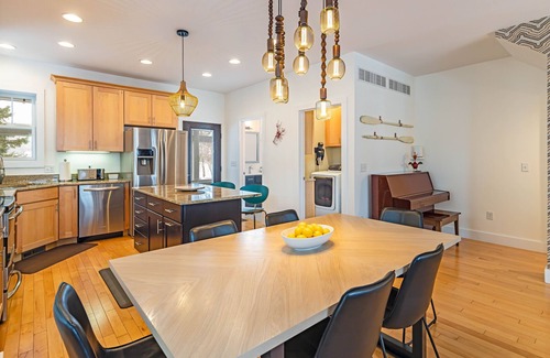 West Wing Estates House | Elegant 3 BR Home with Screened Porch, Year Round Pool & Hot Tub