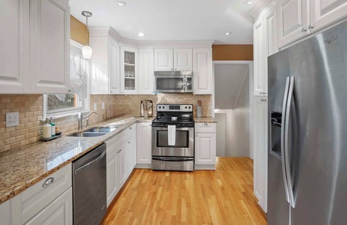 Ashbrook - Clawson Village House | Elegant 4BD Retreat - Backyard BBQ & Theater Room