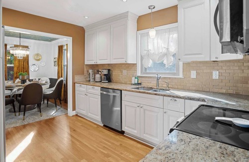 Ashbrook - Clawson Village House | Elegant 4BD Retreat - Backyard BBQ & Theater Room
