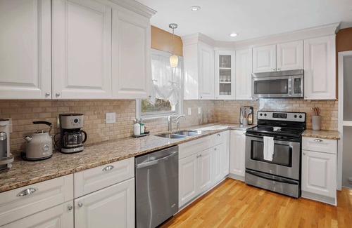 Ashbrook - Clawson Village House | Elegant 4BD Retreat - Backyard BBQ & Theater Room