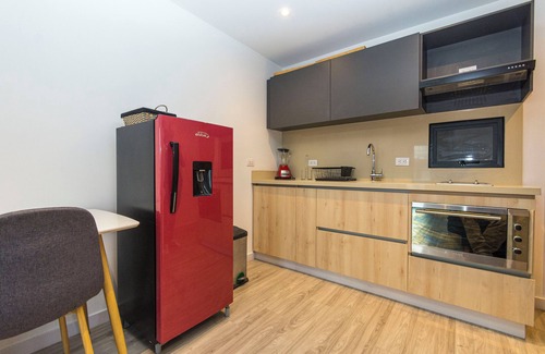 Antiguo Country Apartment | Elegant apartment with view of the city, mountains, 500 MB, swimming pool, gym and spa