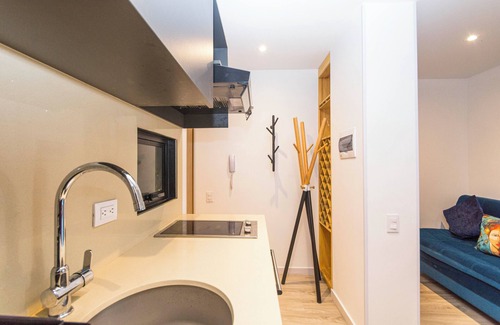 Antiguo Country Apartment | Elegant apartment with view of the city, mountains, 500 MB, swimming pool, gym and spa