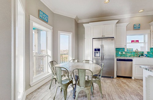 Galveston House | Elegant canal-front home with dock, firepit, deck & kayaks - close to beach