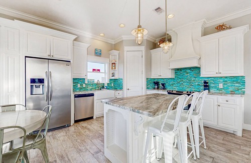 Galveston House | Elegant canal-front home with dock, firepit, deck & kayaks - close to beach