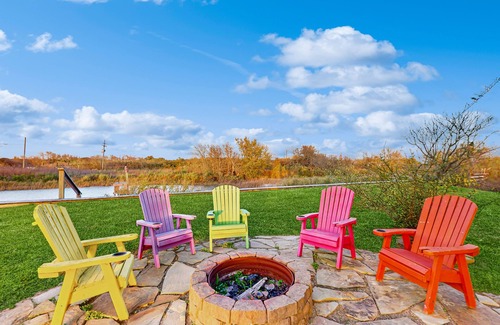 Galveston House | Elegant canal-front home with dock, firepit, deck & kayaks - close to beach