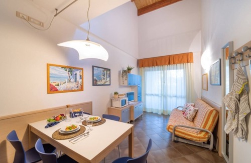 Bibione Apartment | Elegant duplex apartment with shared pool