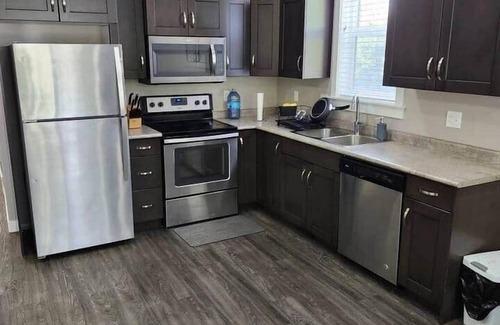 Regina Apartment | Elegant Family Home by Stadium, Airport, Shopping